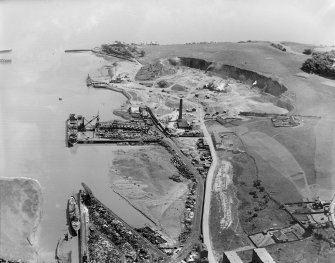 Tilbury Contracting and Dredging Co. Ltd. Quarry and Thomas Ward and Sons Shipbreaking Yard, Inverkeithing.  Oblique aerial photograph taken facing east.