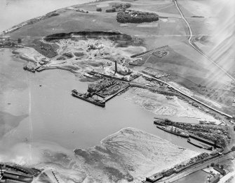 Tilbury Contracting and Dredging Co. Ltd. Quarry and Thomas Ward and Sons Shipbreaking Yard, Inverkeithing.  Oblique aerial photograph taken facing south.