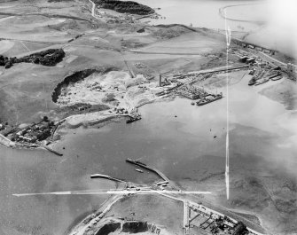 Tilbury Contracting and Dredging Co. Ltd. Quarry and Thomas Ward and Sons Shipbreaking Yard, Inverkeithing.  Oblique aerial photograph taken facing south-west.  This image has been produced from a crop marked negative.