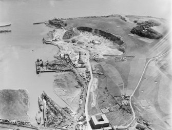 Tilbury Contracting and Dredging Co. Ltd. Quarry and Thomas Ward and Sons Shipbreaking Yard, Inverkeithing.  Oblique aerial photograph taken facing east.