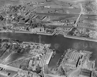 Glasgow, general view, showing Yoker Power Station and Renfrew Ferry.  Oblique aerial photograph taken facing north.