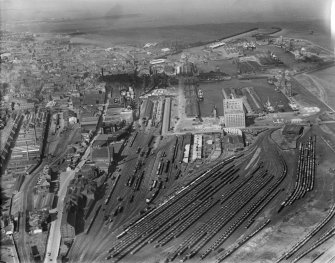 Edinburgh, general view, showing Edinburgh Dock and railway sidings, Leith.  Oblique aerial photograph taken facing north-west.