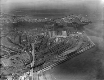 Edinburgh, general view, showing Leith Docks and Seafield Road.  Oblique aerial photograph taken facing north-west.