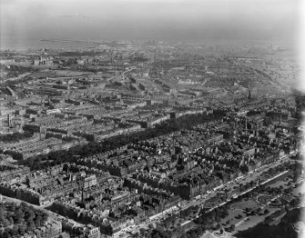 Edinburgh, general view, showing Queen Street Gardens and Firth of Forth.  Oblique aerial photograph taken facing north-east.