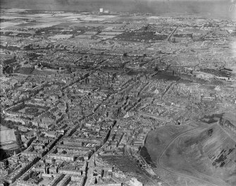 Edinburgh, general view, showing Salisbury Crags and Princes Street Gardens.  Oblique aerial photograph taken facing north.