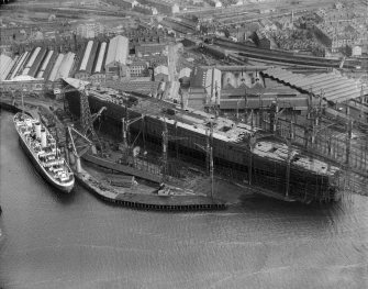 John Brown's Shipyard, Clydebank, Queen Mary under construction.  Oblique aerial photograph taken facing east.