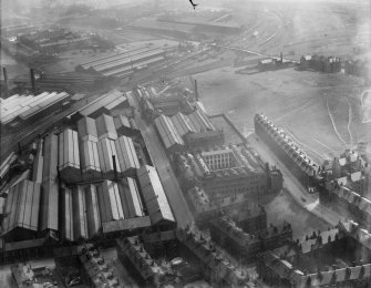 Glasgow, general view, showing Craigpark Electric Cable Co. Ltd. Works, Flemington Street, and North British Locomotive Co. building.  Oblique aerial photograph taken facing south-east.