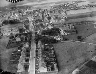Pittenweem, general view, showing Parish Kirk Manse and Marygate.  Oblique aerial photograph taken facing west.  This image has been produced from a damaged negative.