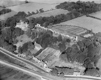 Dunimarle Castle and St Serf's Church, Blairburn, Culross.  Oblique aerial photograph taken facing north-west.
