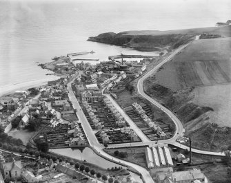 Stonehaven, general view, showing Dunnottar Avenue and Stonehave Harbour.  Oblique aerial photograph taken facing south-east.