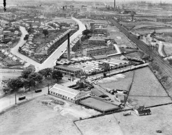 Glasgow, general view, showing Richmond Park Laundry, Cambuslang Road and Hamilton Road.  Oblique aerial photograph taken facing west.