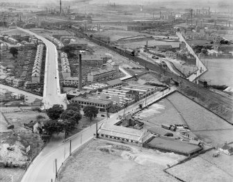 Glasgow, general view, showing Richmond Park Laundry, Cambuslang Road and Main Street.  Oblique aerial photograph taken facing north-west.