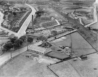 Glasgow, general view, showing Richmond Park Laundry, Cambuslang Road and Main Street.  Oblique aerial photograph taken facing west.