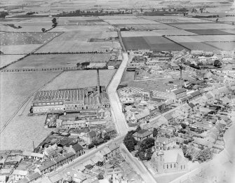 Kirkcaldy, general view, showing Hawkleymuir Linen Factory and Viewforth Parish Church, Viewforth Street.  Oblique aerial photograph taken facing north.