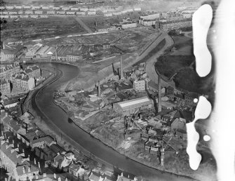 Sandeman Brothers Ruchill Oil Works, Murano Street, Maryhill, Glasgow.  Oblique aerial photograph taken facing north.  This image has been produced from a damaged negative.