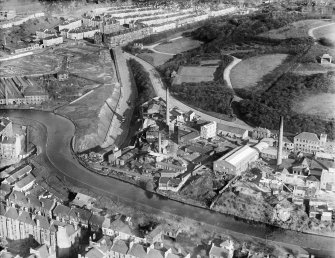 Glasgow, general view, showing Ruchill Park and Sandeman Brothers Ruchill Oil Works, Murano Street, Maryhill.  Oblique aerial photograph taken facing north-east.
