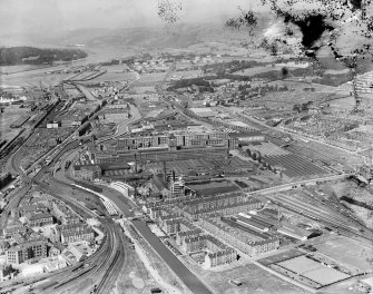 Singer Sewing Machine Factory, Kilbowie Street, Clydebank.  Oblique aerial photograph taken facing north-west.  This image has been produced from a damaged negative.