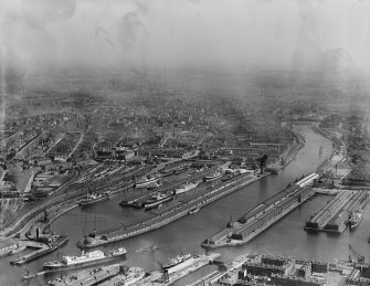 Glasgow, general view, showing Queen's Dock and New Approach Viaduct.  Oblique aerial photograph taken facing east.