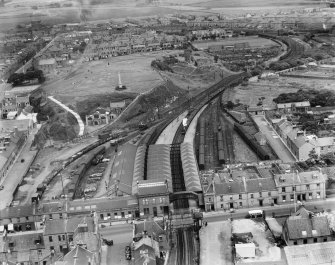 Ardrossan Town Station and Castle Hill, Ardrossan.  Oblique aerial photograph taken facing north.