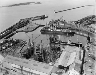 Ardrossan Old Dock and Breakwater, Ardrossan.  Oblique aerial photograph taken facing north.