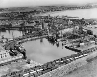 Ardrossan Old Dock and South Bay, Ardrossan.  Oblique aerial photograph taken facing east.