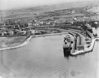 Ardrossan, general view, showing Montgomerie Pier and Ardrossan Refinery.  Oblique aerial photograph taken facing east.