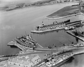 Montgomerie Pier and Winton Pier, Ardrossan Harbour.  Oblique aerial photograph taken facing north-east.