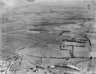 Airdrie, general view, showing Burnhead Quarry.  Oblique aerial photograph taken facing north-west.