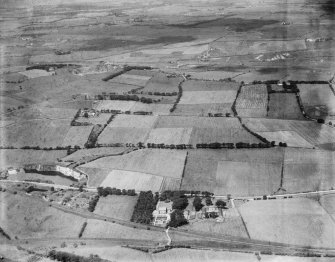 Airdrie, general view, showing Burnhead Quarry.  Oblique aerial photograph taken facing north-west.