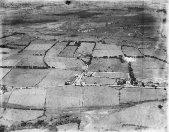 Plains, general view, showing Meadowhead Road and Airdrie Road.  Oblique aerial photograph taken facing north.  This image has been produced from a damaged negative.