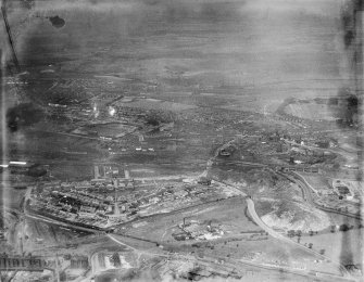 Coatbridge, general view, showing Cliftonhill Stadium and Dunbeth Public Park.  Oblique aerial photograph taken facing north.  This image has been produced from a damaged negative.