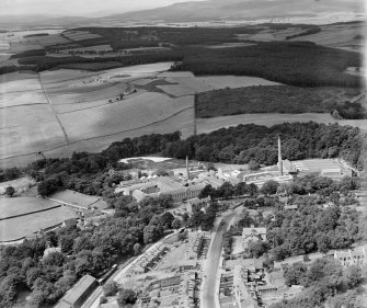 Culter Mills Paper Co. Ltd. Paper Mill, Peterculter.  Oblique aerial photograph taken facing west.