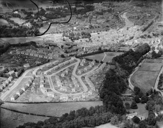 Hawick, general view, showing Moar Park and Upper Common Haugh.  Oblique aerial photograph taken facing north.  This image has been produced from a damaged negative.