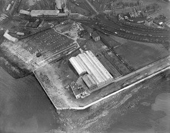 Former Ardrossan Dry Dock and Shipbuilding Co. Inches Yard, Ardrossan.  Oblique aerial photograph taken facing north.