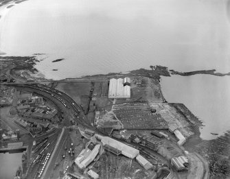 Ardrossan, general view, showing former Ardrossan Dry Dock and Shipbuilding Co. Inches Yard and Harbour Road.  Oblique aerial photograph taken facing south-east.