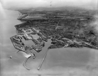 Edinburgh, general view, showing Leith Docks and Leith Links.  Oblique aerial photograph taken facing south.