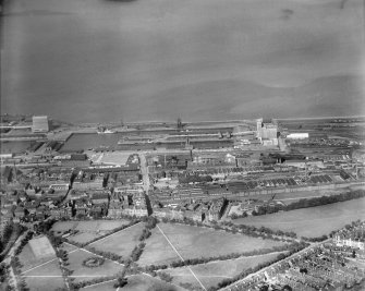 Edinburgh, general view, showing Edinburgh Dock and Leith Links.  Oblique aerial photograph taken facing north-east.