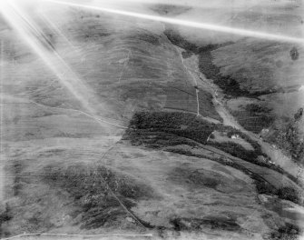 Glenapp Estate, general view, showing Carlock Hill and Benahaur.  Oblique aerial photograph taken facing east.