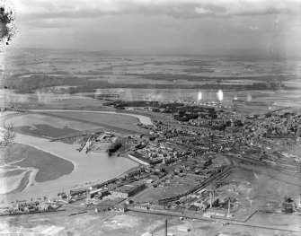 Irvine, general view, showing River Irvine and Montgomery Street.  Oblique aerial photograph taken facing north.  This image has been produced from a damaged negative.