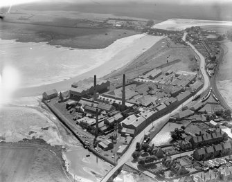 William Haig and Sons Guardbridge Paper Co. Paper Mill, Main Street, Guardbridge.  Oblique aerial photograph taken facing south.
