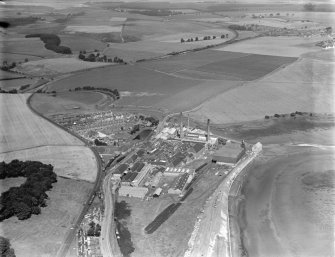 William Haig and Sons Guardbridge Paper Co. Paper Mill, Main Street, Guardbridge.  Oblique aerial photograph taken facing north.