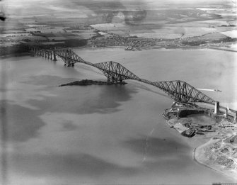 Forth Rail Bridge and Inch Garvie, Firth of Forth.  Oblique aerial photograph taken facing south-west.