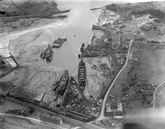 Thomas Ward and Sons Shipbreaking Yard, Inverkeithing.  Oblique aerial photograph taken facing east.