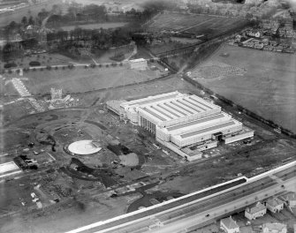 Palace of Engineering, 1938 Empire Exhibition, Bellahouston Park, Glasgow, under construction.  Oblique aerial photograph taken facing east.