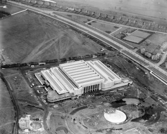 Palace of Engineering, 1938 Empire Exhibition, Bellahouston Park, Glasgow, under construction.  Oblique aerial photograph taken facing south-east.