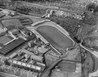 Powderhall Stadium, Powderhall Road, Beaverbank, Edinburgh.  Oblique aerial photograph taken facing west.