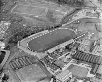 Powderhall Stadium, Powderhall Road, Beaverbank, Edinburgh.  Oblique aerial photograph taken facing north-east.