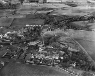 Tullis Russell and Co. Paper Mill, Glenrothes.  Oblique aerial photograph taken facing north.  This image has been produced from a damaged negative.