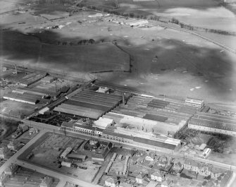 Falkirk Golf Course and R and A Main Ltd. Gothic Works, Glasgow Road, Camelon, Falkirk.  Oblique aerial photograph taken facing north.