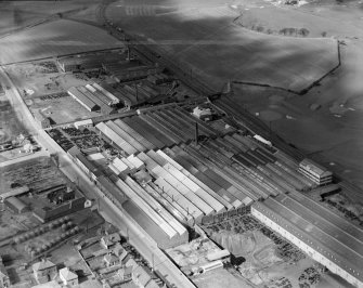 R and A Main Ltd. Gothic Works, Glasgow Road, Camelon, Falkirk.  Oblique aerial photograph taken facing north-west.
